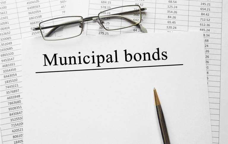 Paper with Municipal Bonds on a table