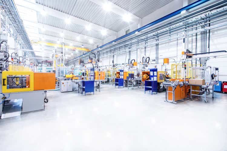 Futuristic machinery in modern production line