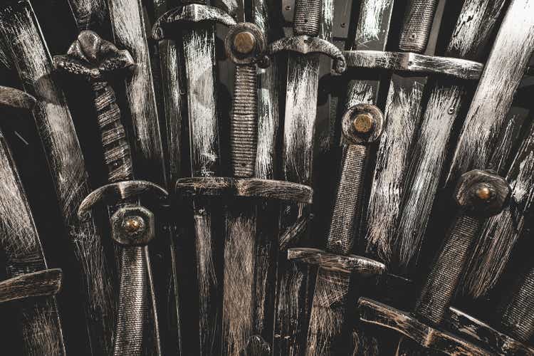 Metal knight swords background.