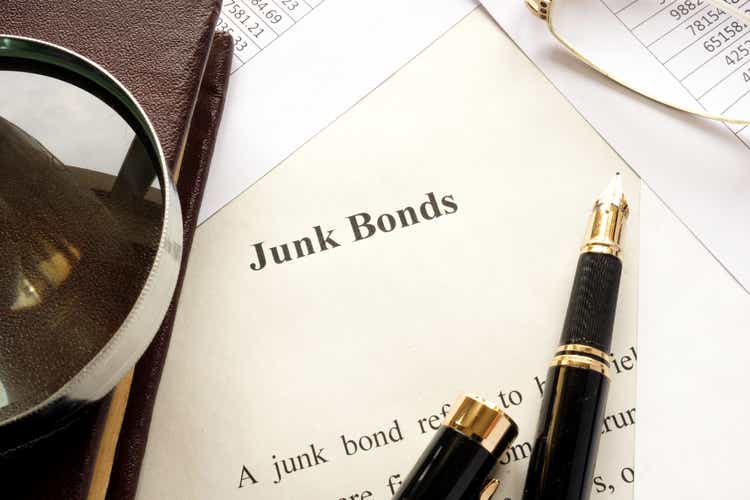 Paper with a title junk bonds and other financial documents.
