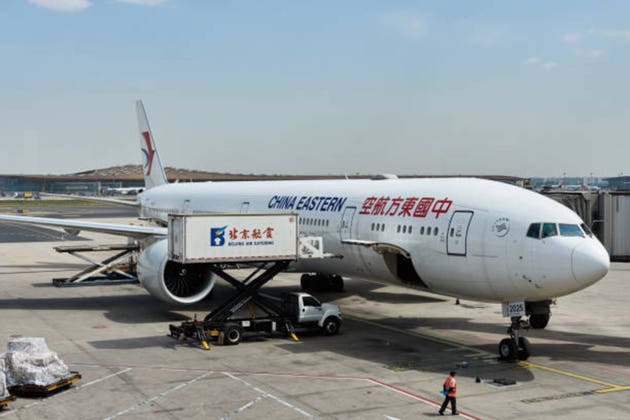 Boeing 777-300ER at the gate at Beijing Capital Airport