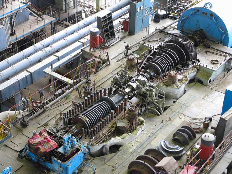 steam turbine in repair process, machinery, pipes, tubes,