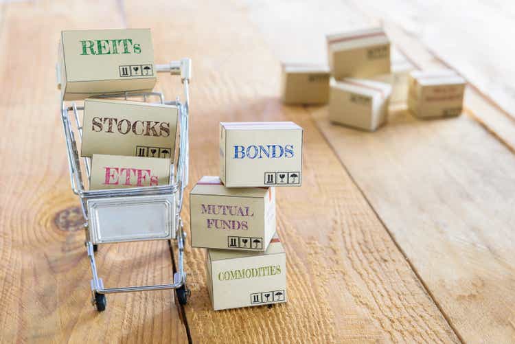 Cartons of financial investment products in a shopping cart.