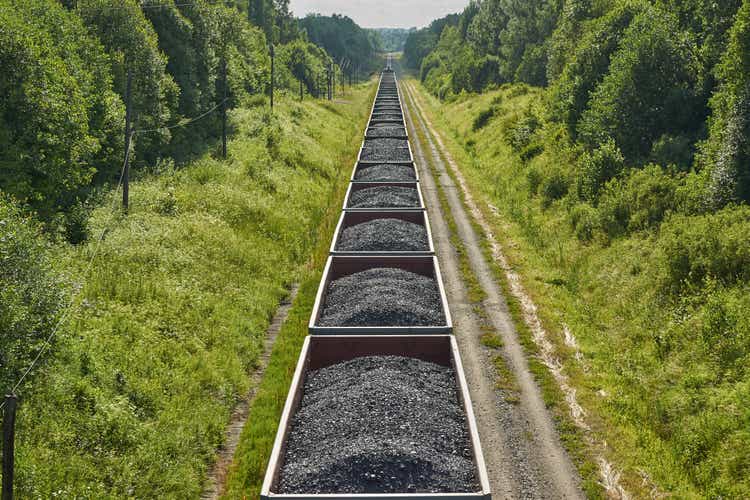 Railway cargo cars carrying coal