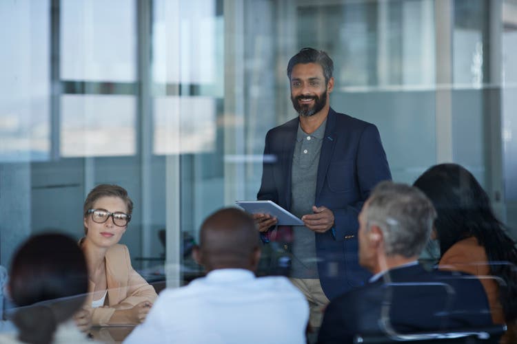 Businessman presenting project in meeting room