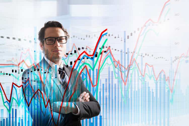 Conceptual image of businessman with graph data