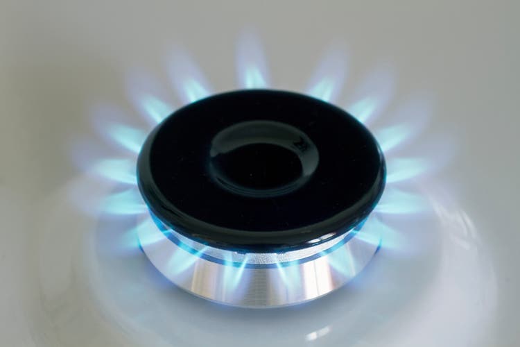 Closeup on a lightened gas burner.