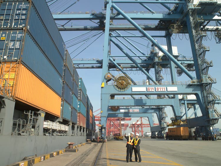 Men at container terminal