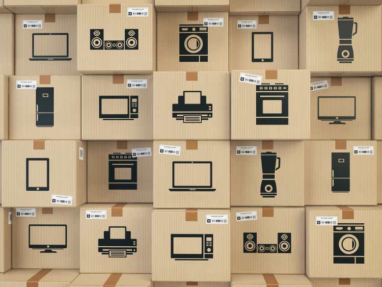 Household kitchen appliances and home electronics in boxes . E-commerce, internet online shopping and delivery concept.