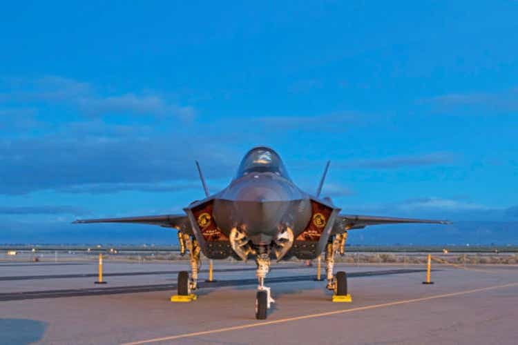 Airplane F-35 Lightning on the runway during sunrise