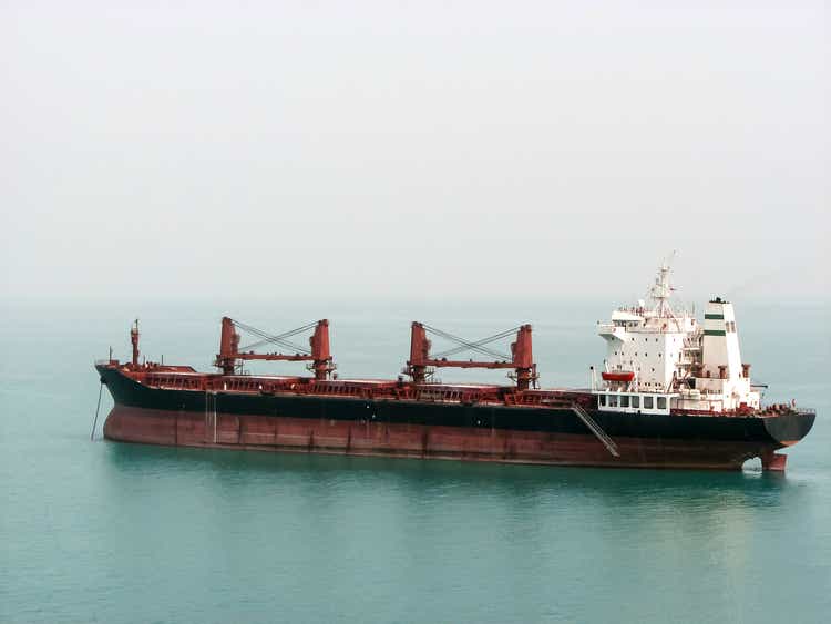 Dry cargo ship at sea, ocean.