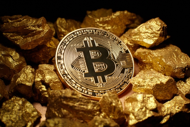 Golden Bitcoin Coin and mound of gold