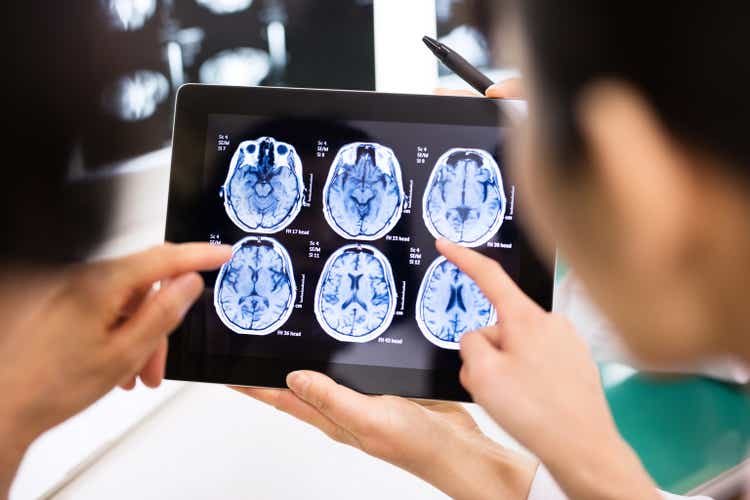 ClearPoint Neuro Stock: Strong Recovery Play Once COVID Subsides (NASDAQ:CLPT) 2 Doctor and patient using digital tablet in hospital