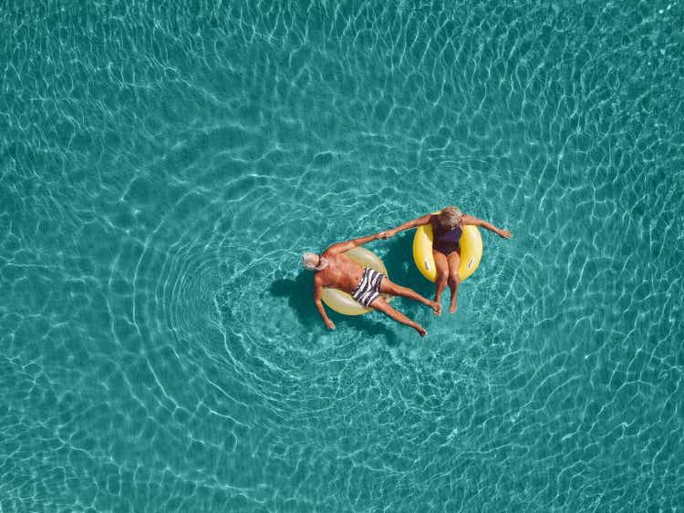 Senior couple enjoy sea water