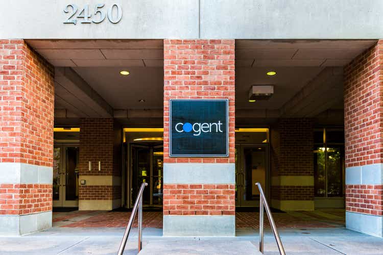 Cogent sign on building exterior, a corporation Internet Service Provider, delivering Internet, Ethernet and Colocation services