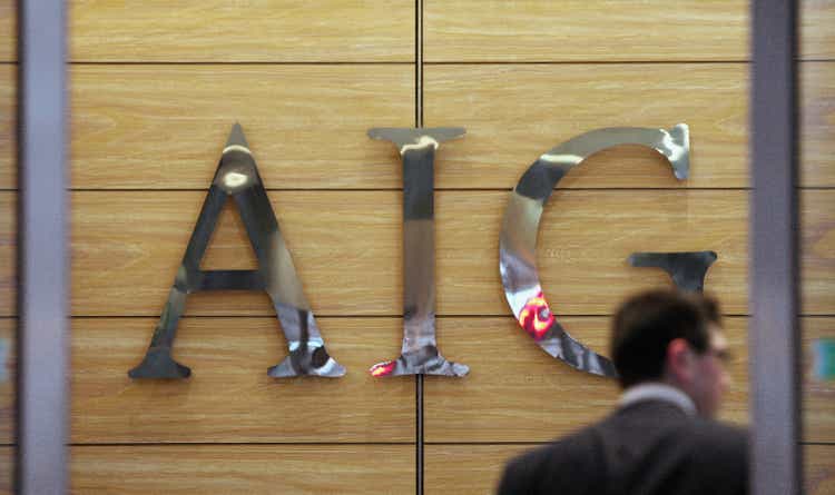 Workers Arrive At The Offices Of Troubled Insurance Company AIG