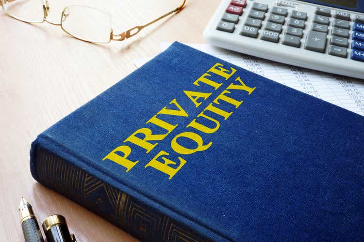 Book with title private equity and calculator.