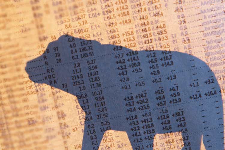 Stock quotes and silhouette of a bear