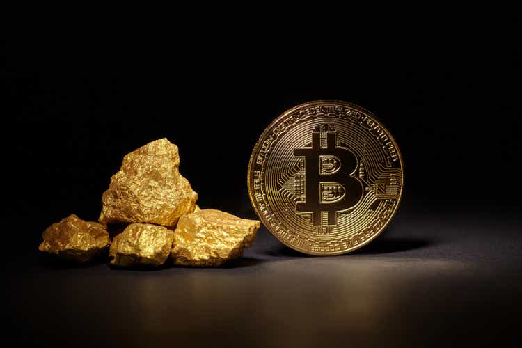 Golden Bitcoin coin and pile of gold on black background