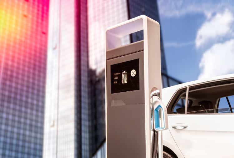 Charging station for electric cars with façade of a skyscraper