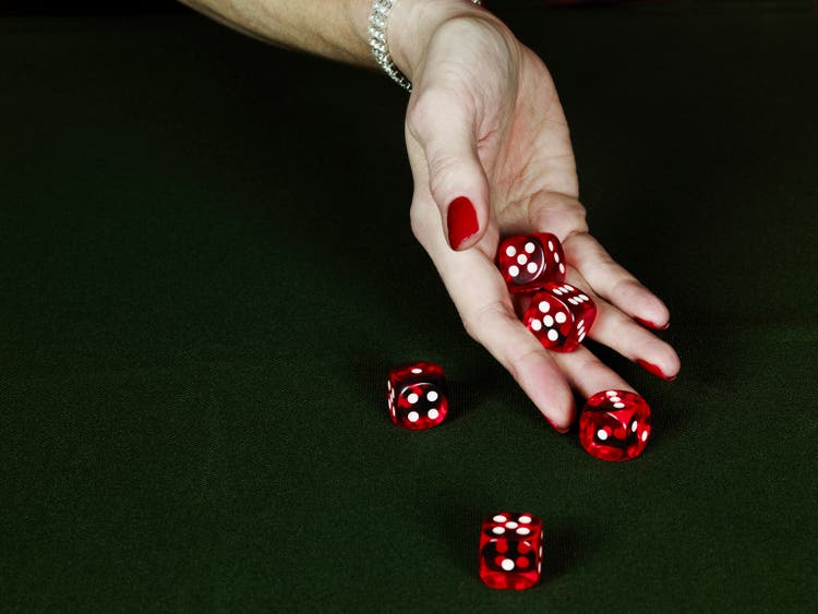 Woman rolling dice