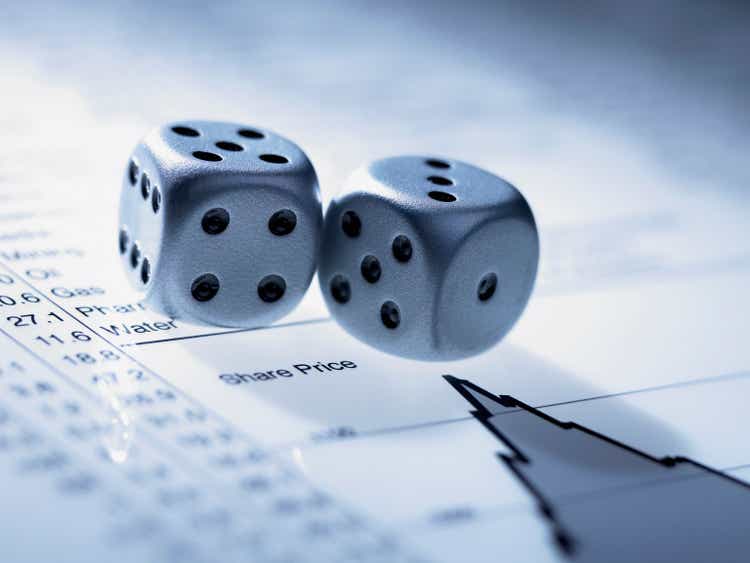 Silver dice on list of share prices