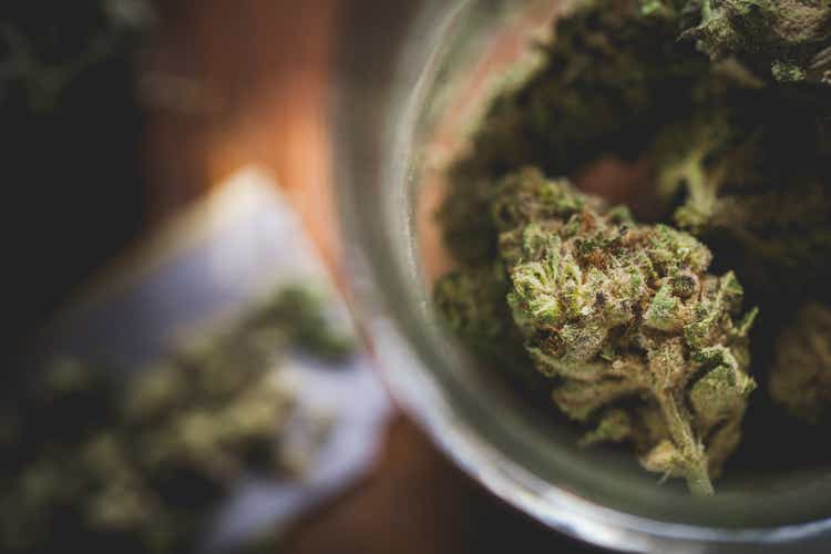 Marijuana in a jar. Cannabis joint. Medical or recreative