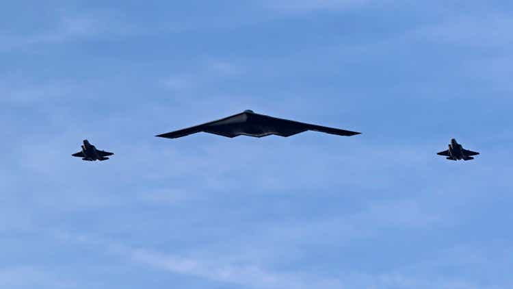 Airplanes B-2 bomber and pair of F-35 Lightning jet fighters flying over the 2018 Tournament of Roses Parade in Pasadena, California