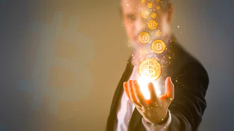 making money with bitcoin - Bitcoins coming from business man
