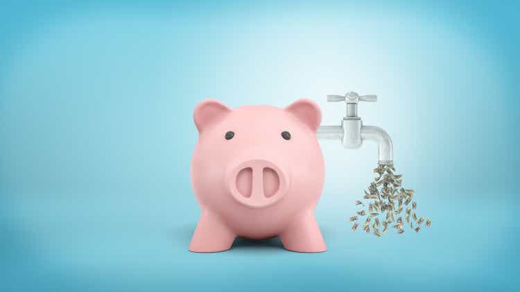 3D rendering of a pink piggy bank in front view with a tap leaking dollar bills attached to the side