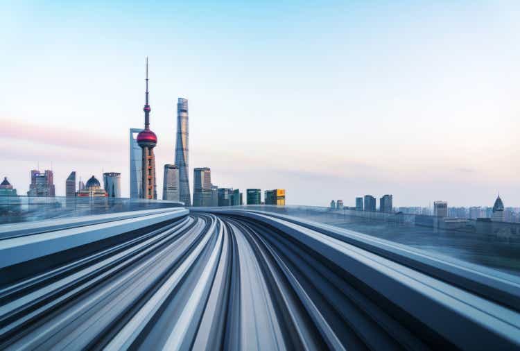 Motion blur of train moving to City