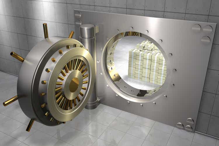 bank vault with stack of 100 dollar bills