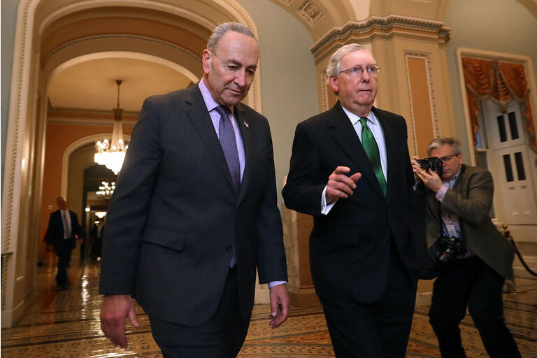 Senate Major Leader McConnell (R-KY) And Senate Minority Leader Schumer (D-NY) Walk To Senate Chamber Together After Budget Deal Reached