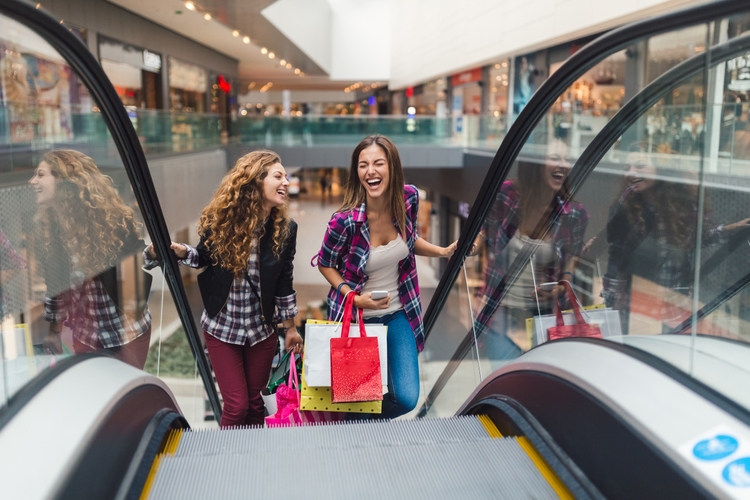 Girls having fun in the shopping center