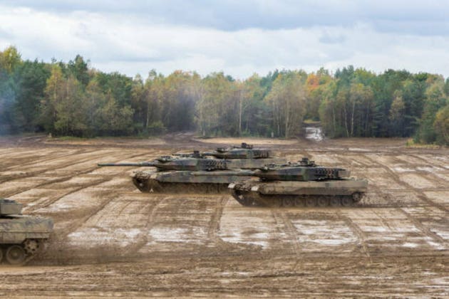 german main battle tanks drives on battlefield