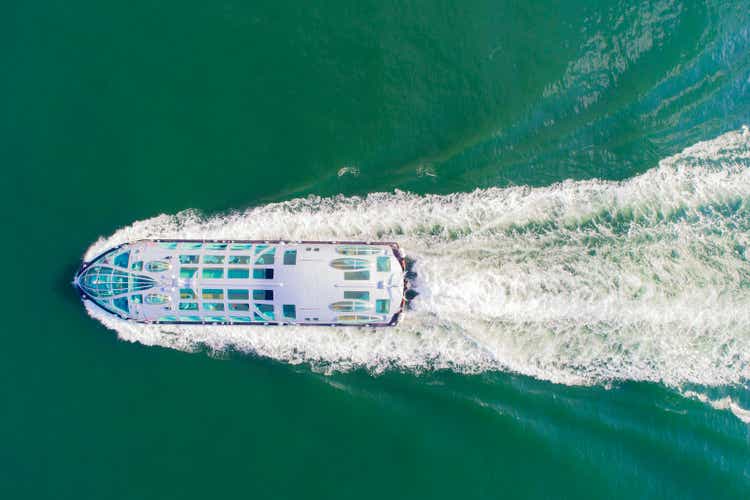 Aerial view of cruise ship on sea.