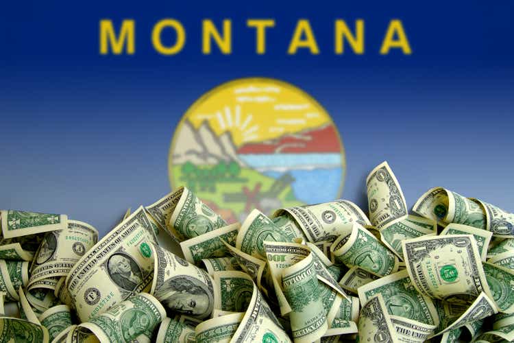 Montana flag with US Dollars