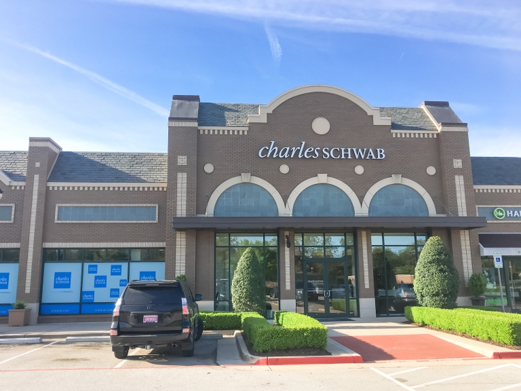 Entrance to Charles Schwab Corporation branch in Irving, Texas, USA