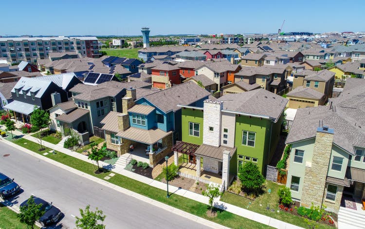 Colorful Mueller Suburb Solar Panel Rooftops and Modern Austin Living
