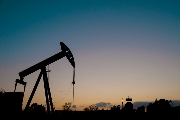 Oil machine digging fuel on the street of Los Angels, America