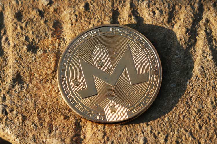 A type of bitcoin famous as monero coin in the middle of rock