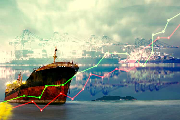 Double exposure of stocks market chart concept with International Container Cargo ship in the ocean, Freight Transportation, Shipping, Nautical Vessel,