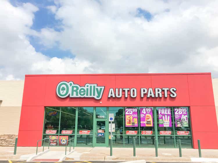 O'Reilly Auto Parts store under cloud blue sky