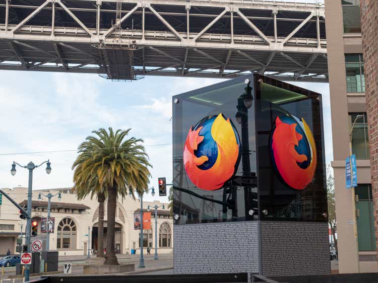 Mozilla Firefox logo outside of San Francisco location with palm tree in background