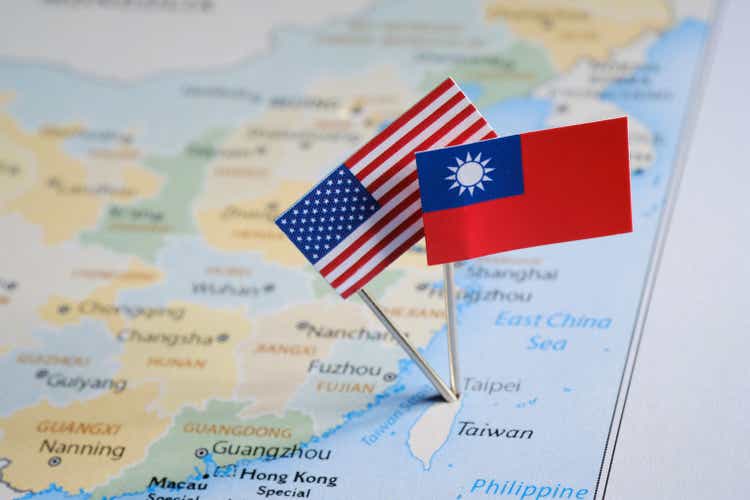 Taiwanese and American flags pinned on the map