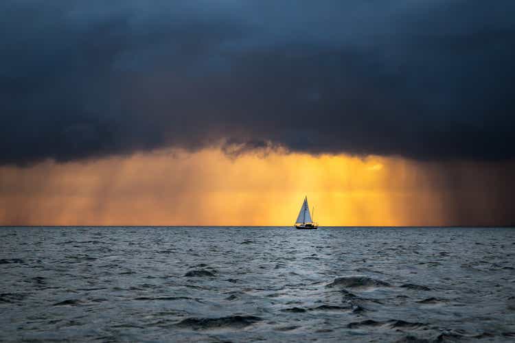 Boat sailing into the storm