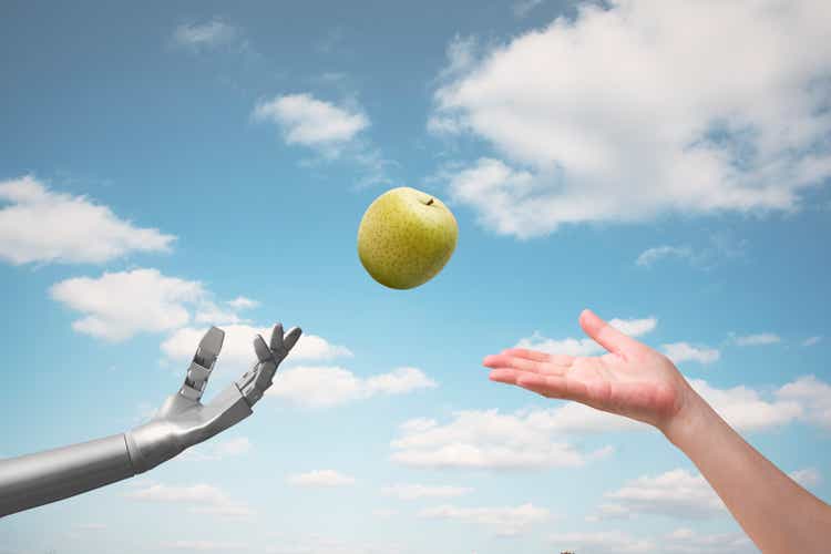 The AI ​​passes a green apple to a girl