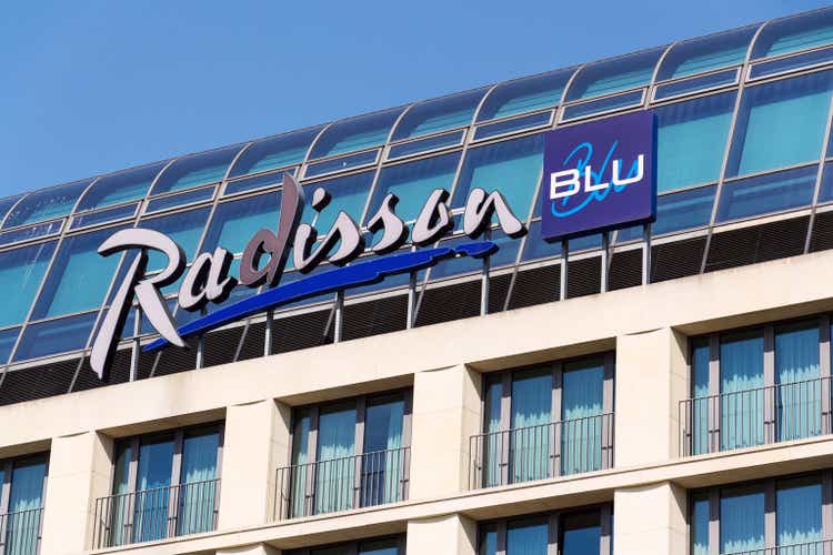 Radisson Blu hotels and resorts logo on the building of hotel