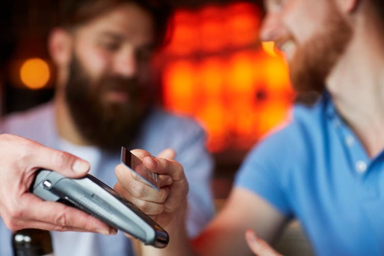 Contactless credit card payment in the bar