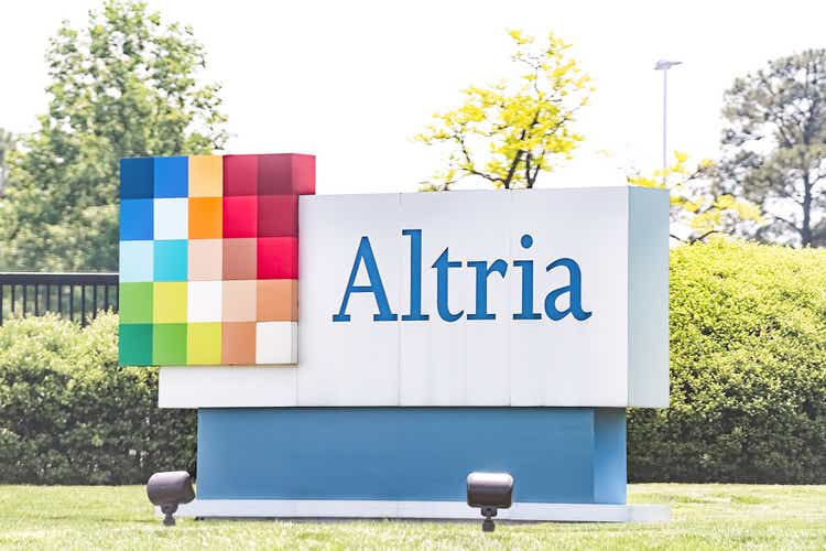 Altria office sign in Virginia capital city tobacco business closeup by road street, parent company of Philip Morris